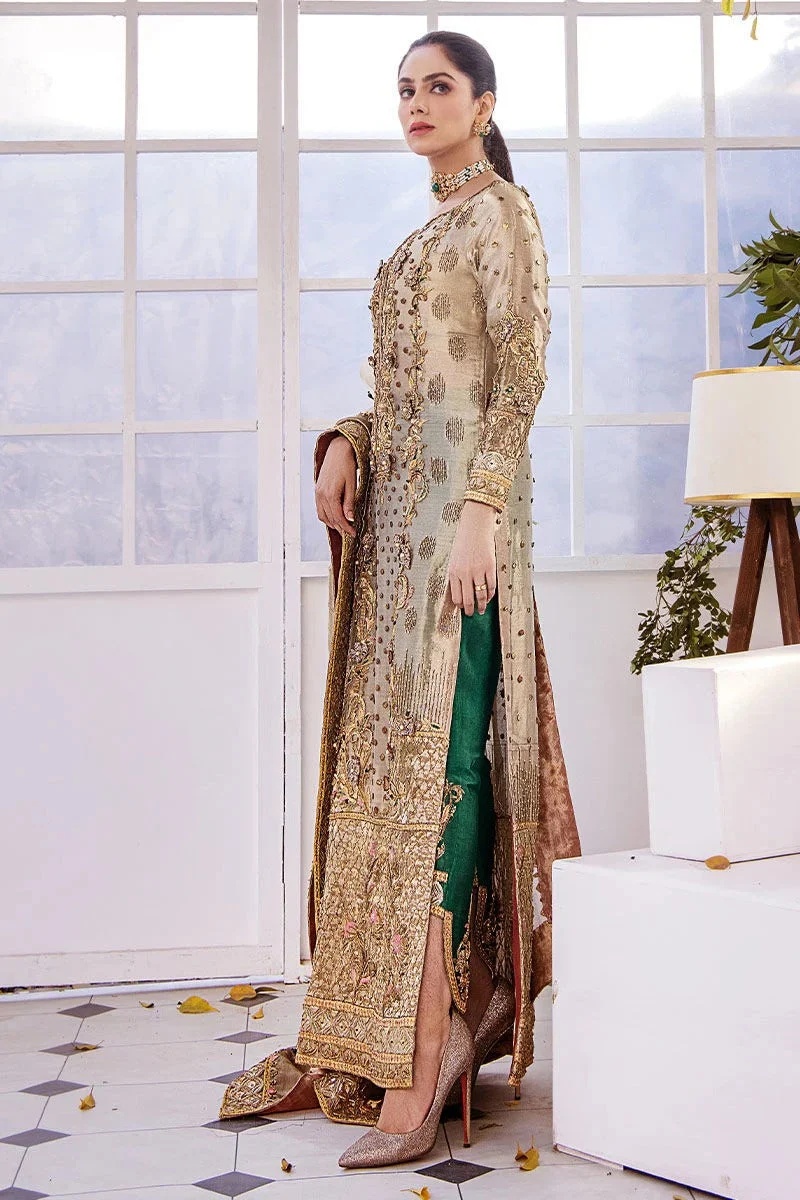 Noor- e- Samar pakistani fashion outfit in gold, green tones.